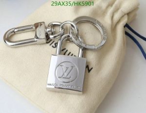 LOUISVUITTON LV LOCKSET KEYCHAIN CHARM IN PURE HEAVY METAL (SILVER)